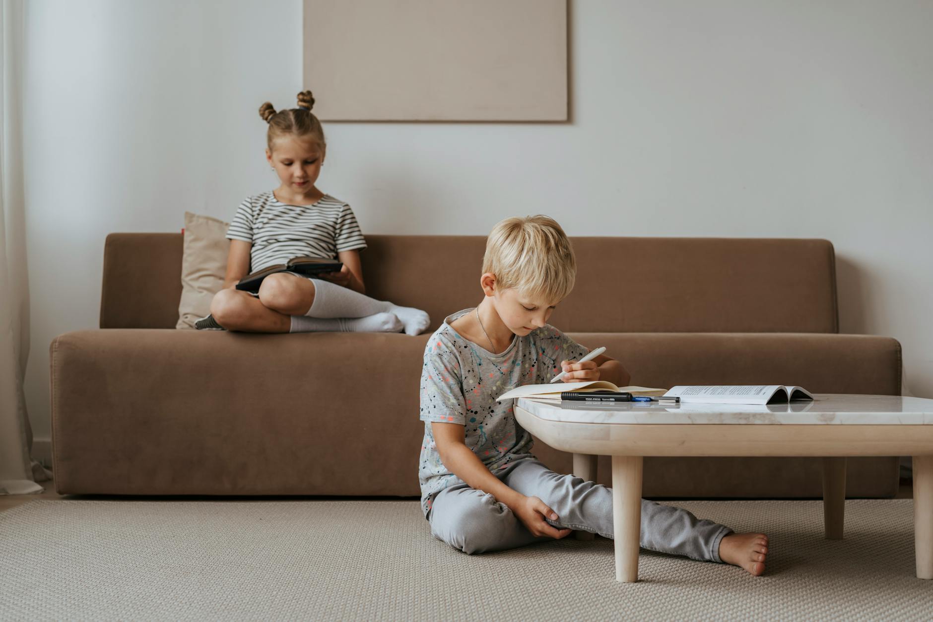 brother and sister studying